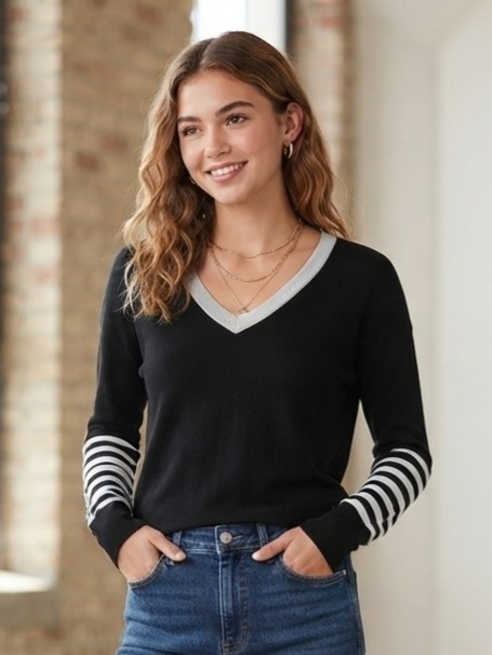 Bianca Nygard Women’s Black V-Neck Sweater with White Trim and Striped Cuffs